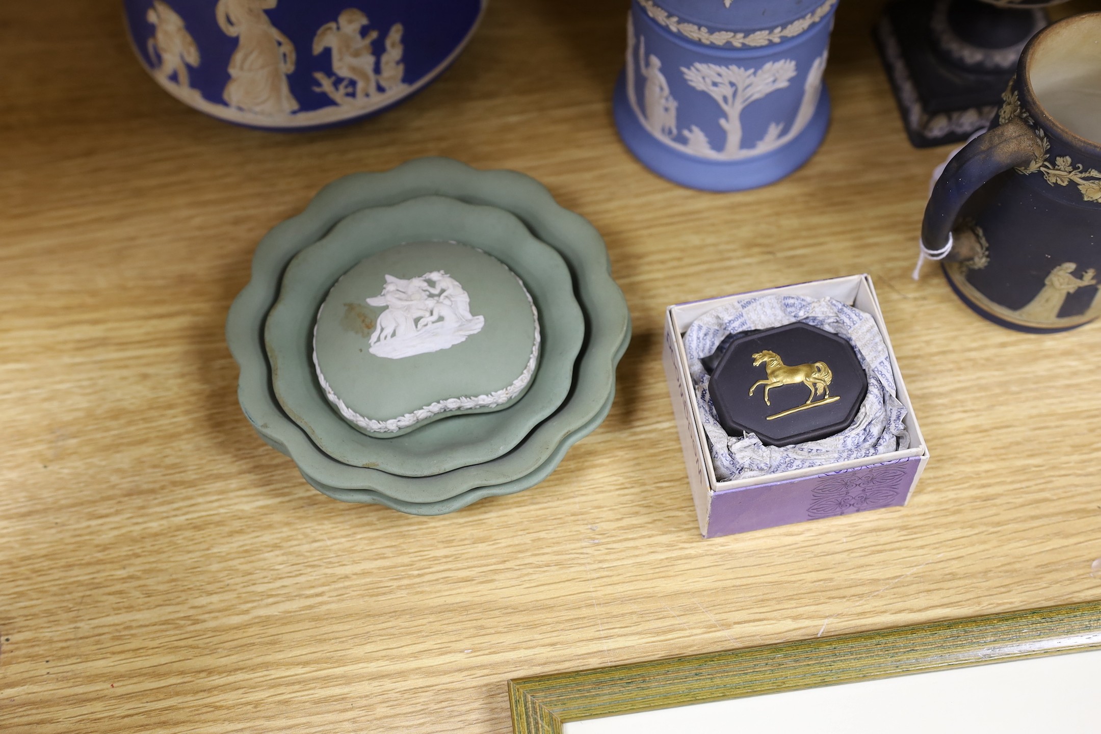 A collection of Victorian and later Jasperware, including a 19th century Wedgwood version of the Portland vase, 23 cms high